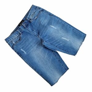 Blue Faith High Rise Distressed Denim Shorts.